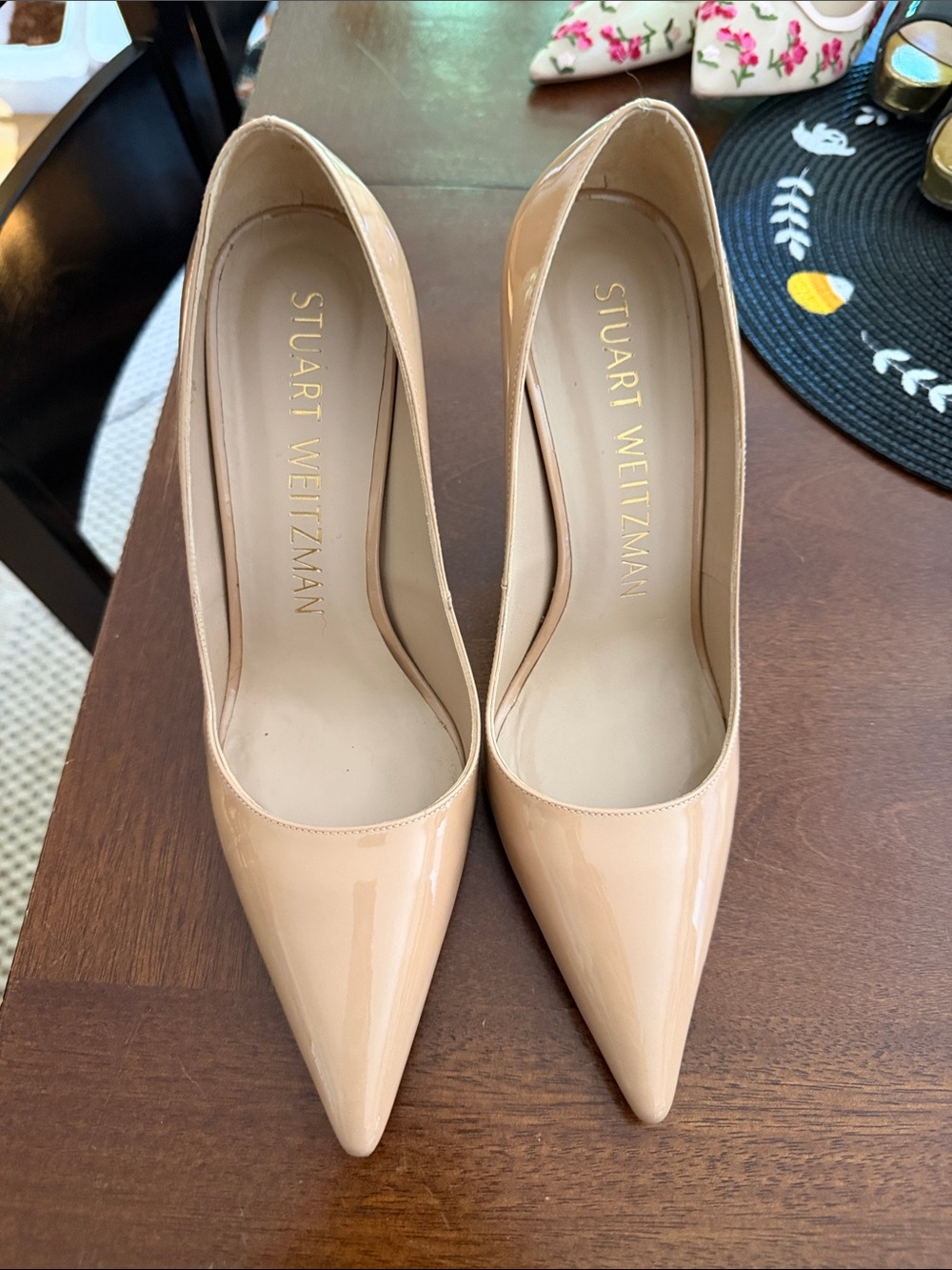 Stuart Weitzman Patent Pointed-Toe Pumps in Nude